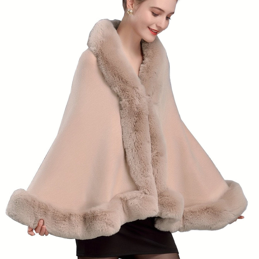 Damponcho med fuskpälsdetaljer Vinterkappa