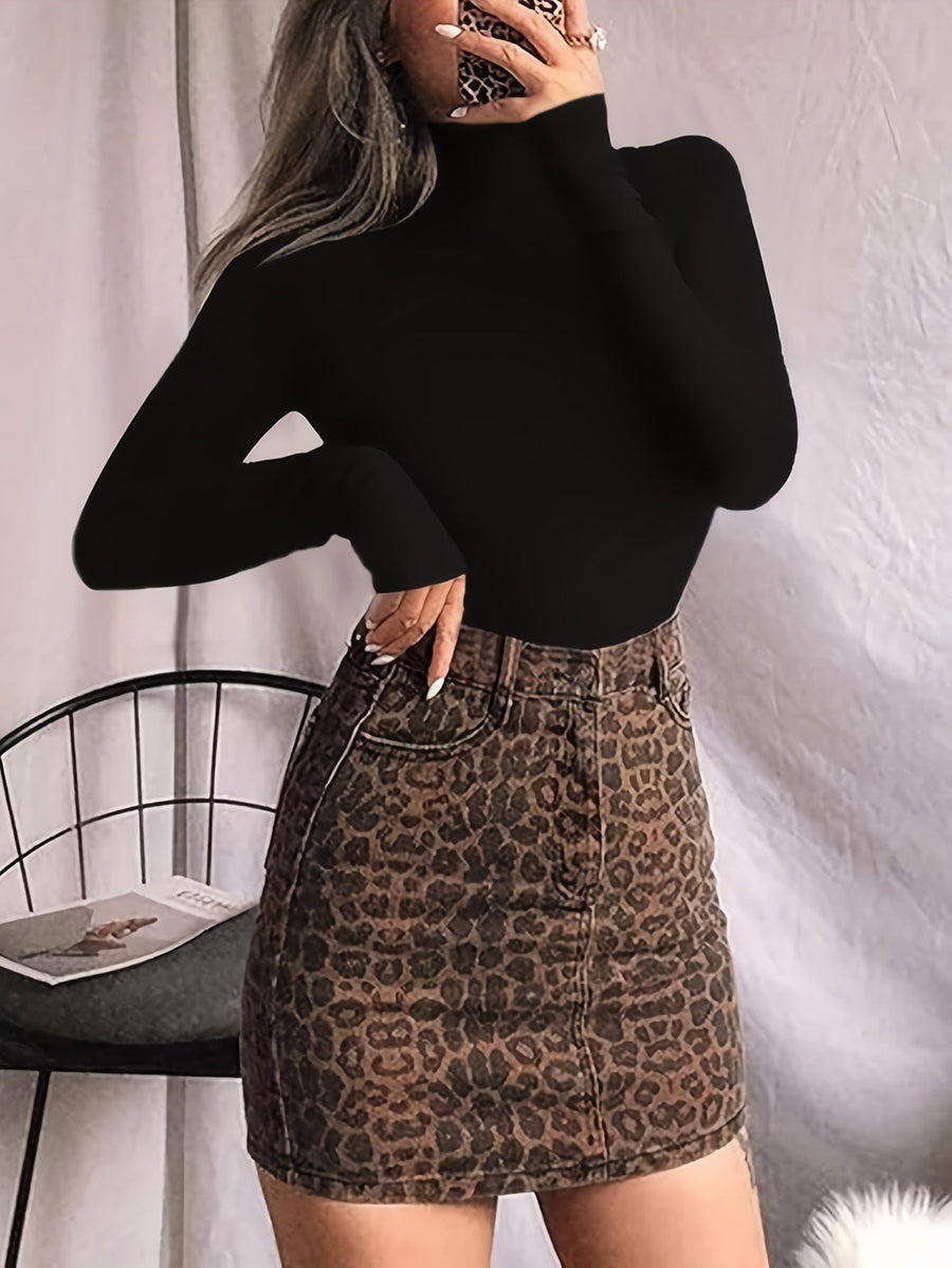 Svart långärmad bodysuit med hög krage och termisk effekt