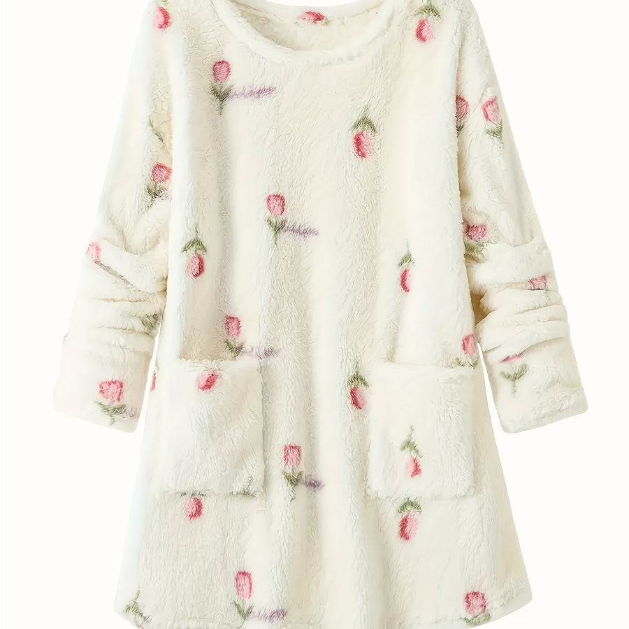 Vit nattlinne i mjukt material med blommigt mönster och fickor