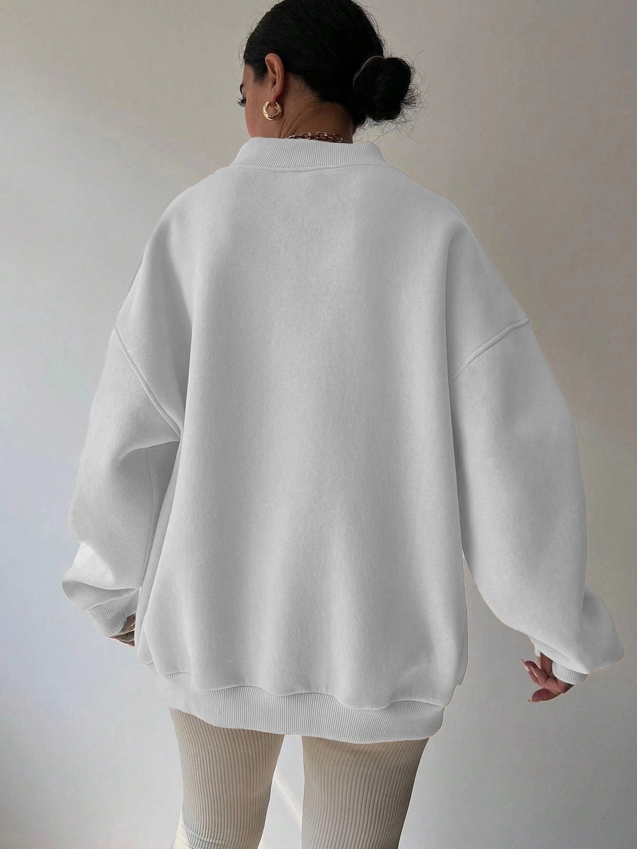 Vit Sweatshirt med V-ringning och Ribbade Detaljer
