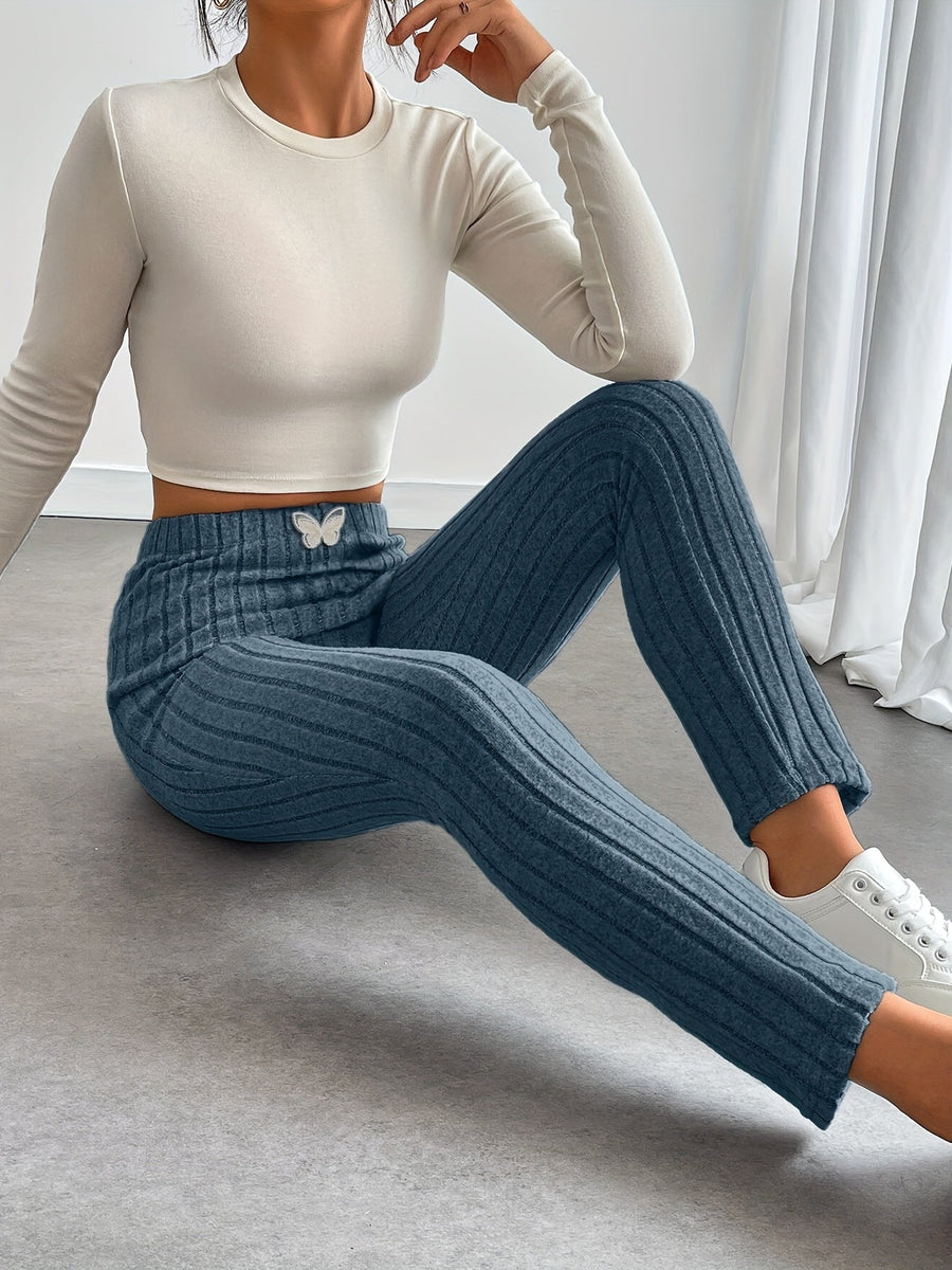 Gråa Dam Leggings med Ribbad Struktur och Fjärilsdetalj, Hög Midja