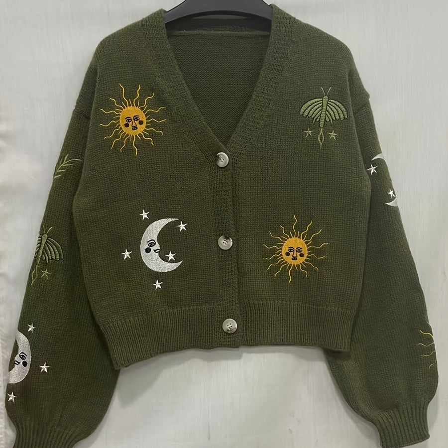Stickad kofta med V-ringning och broderade sol- och månmotiv, flera färger