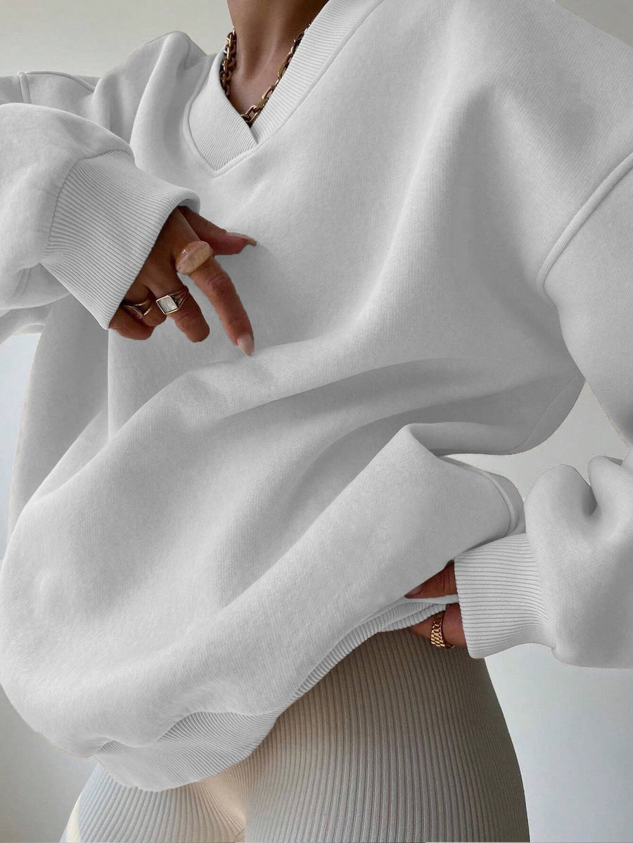 Vit Sweatshirt med V-ringning och Ribbade Detaljer