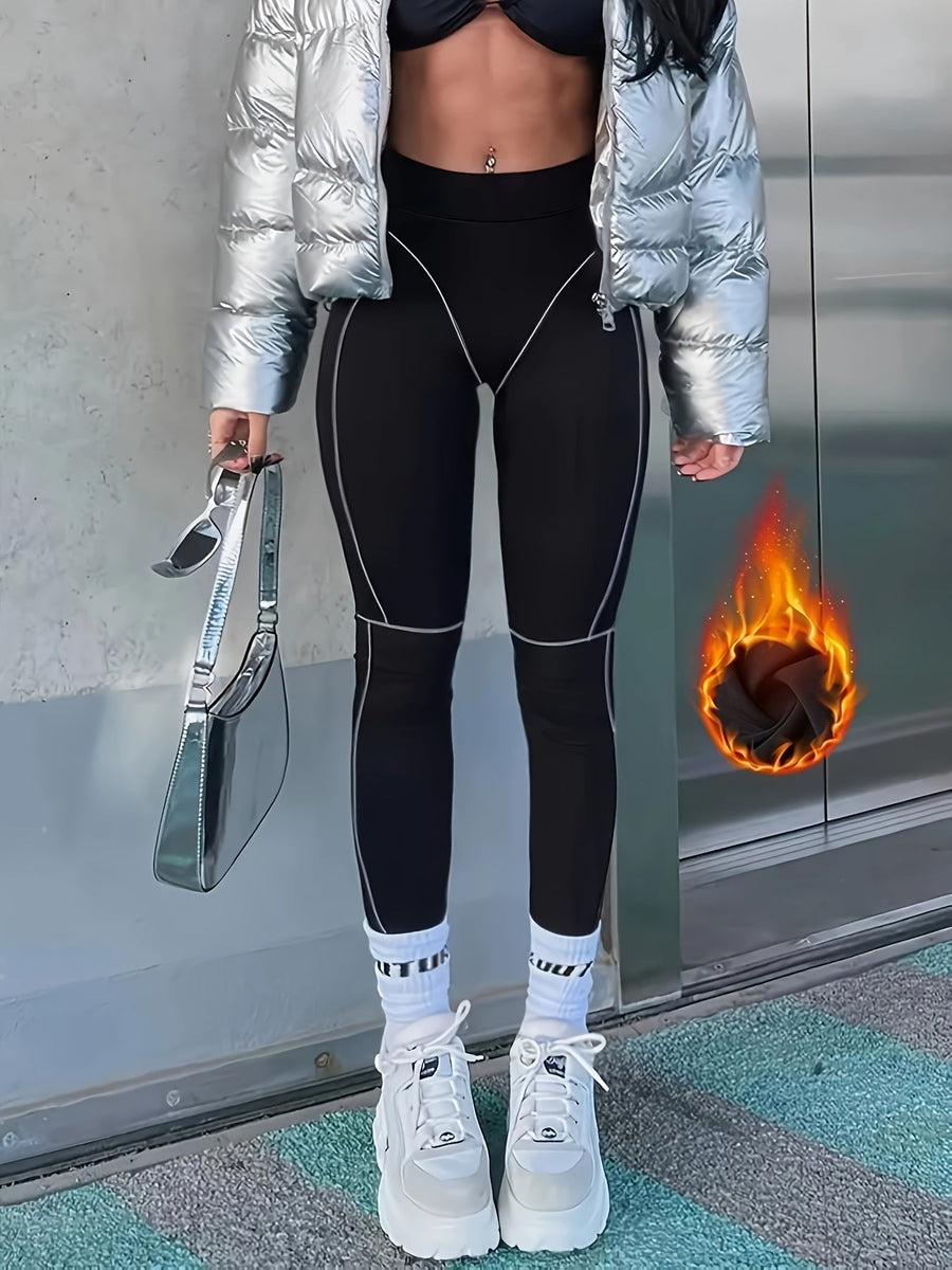 Svarta leggings med kontrasterande sömmar, hög midja