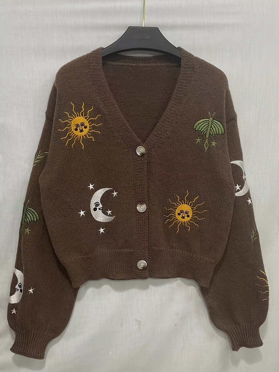 Stickad kofta med V-ringning och broderade sol- och månmotiv, flera färger
