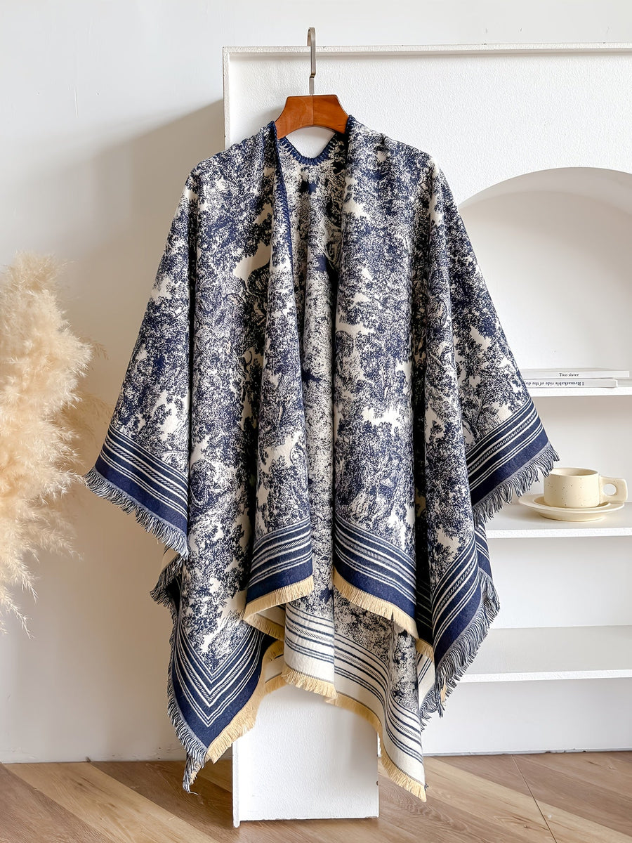 Poncho med mönster och fransar – flera färger