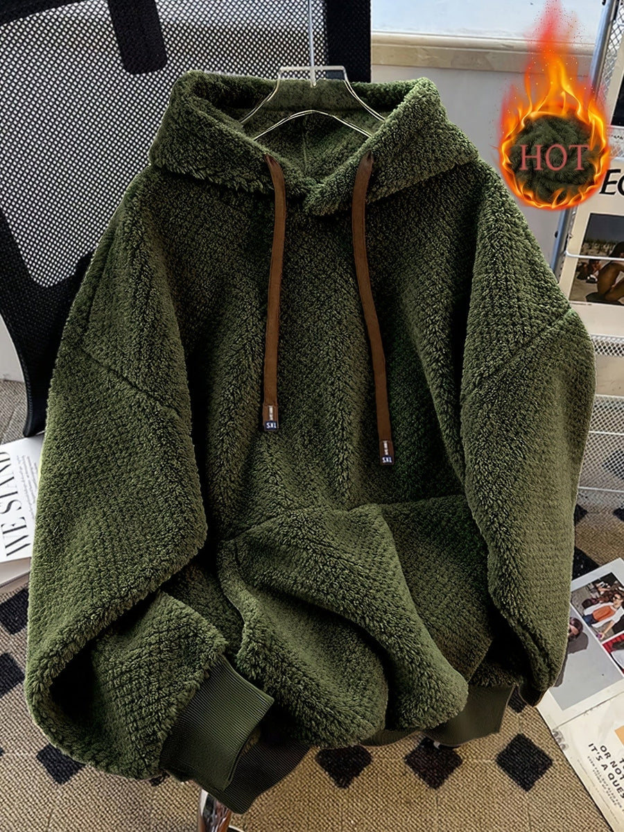 Unisex teddyfleece hoodie med dragsko och magficka