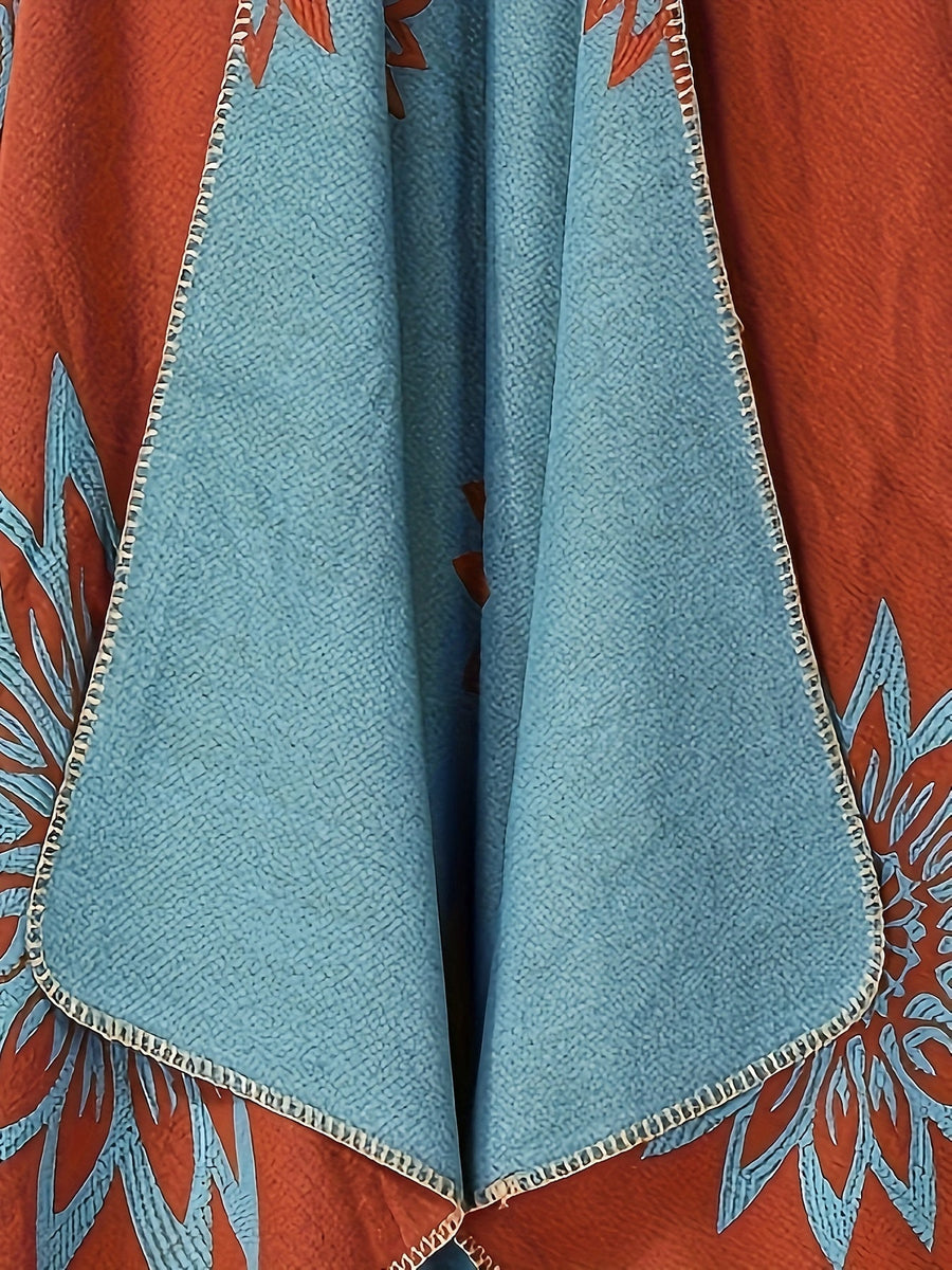 Vändbar poncho med blommönster, svart och grå