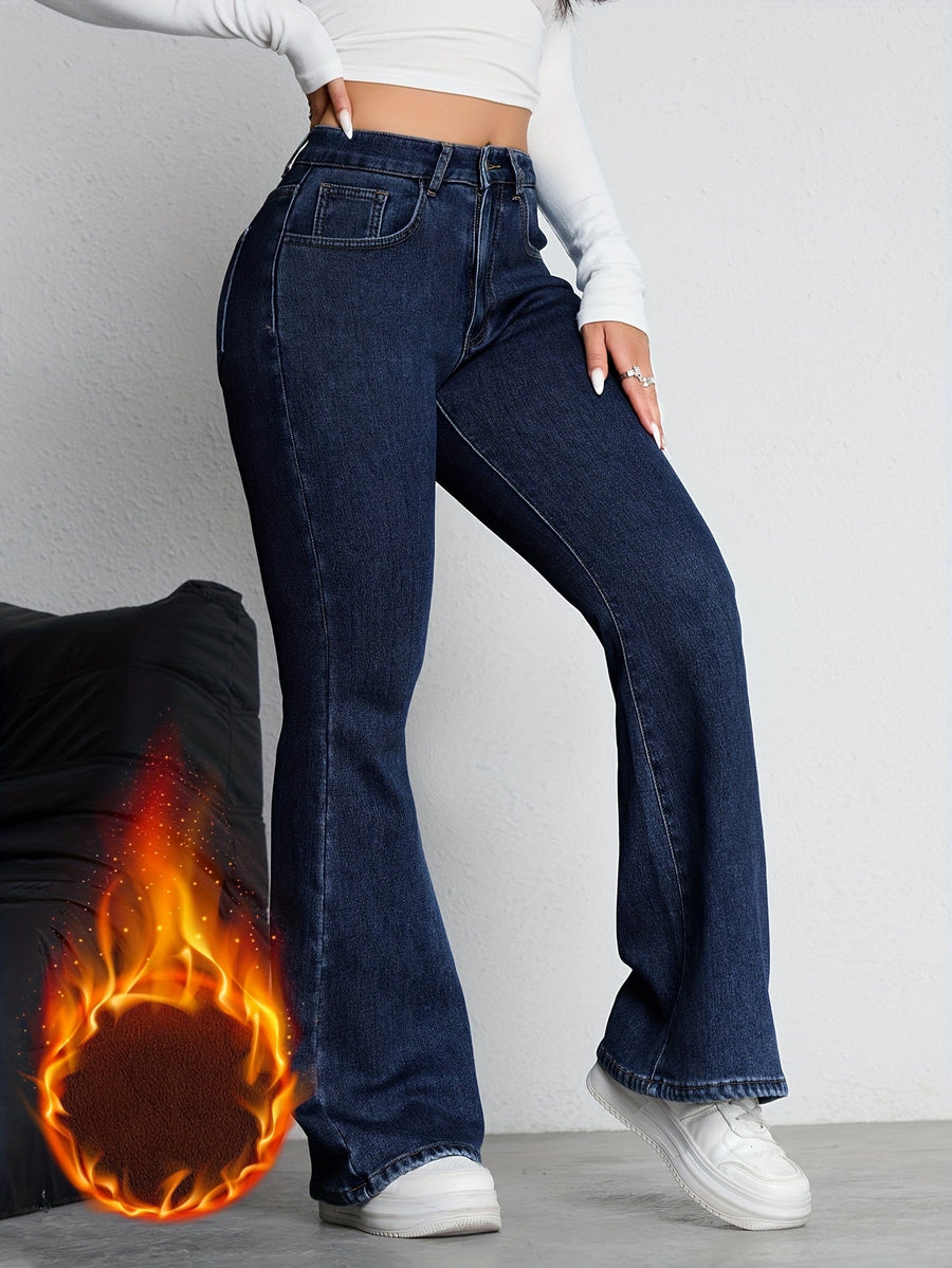 Mörkblå utsvängda damjeans med hög midja