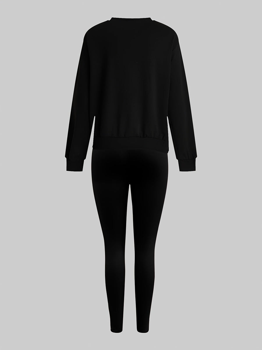 Set med sweatshirt och leggings med tassavtryck