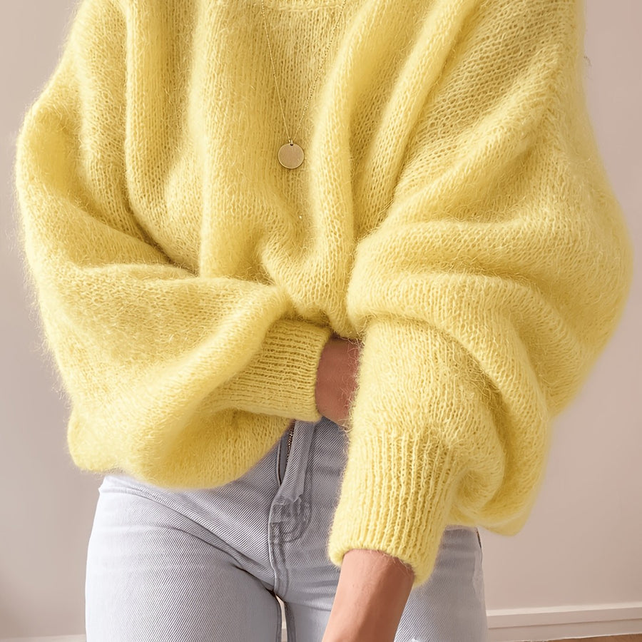 Lösstickad tröja med rund hals och lång ärm - Fluffig design med ribbstickade muddar