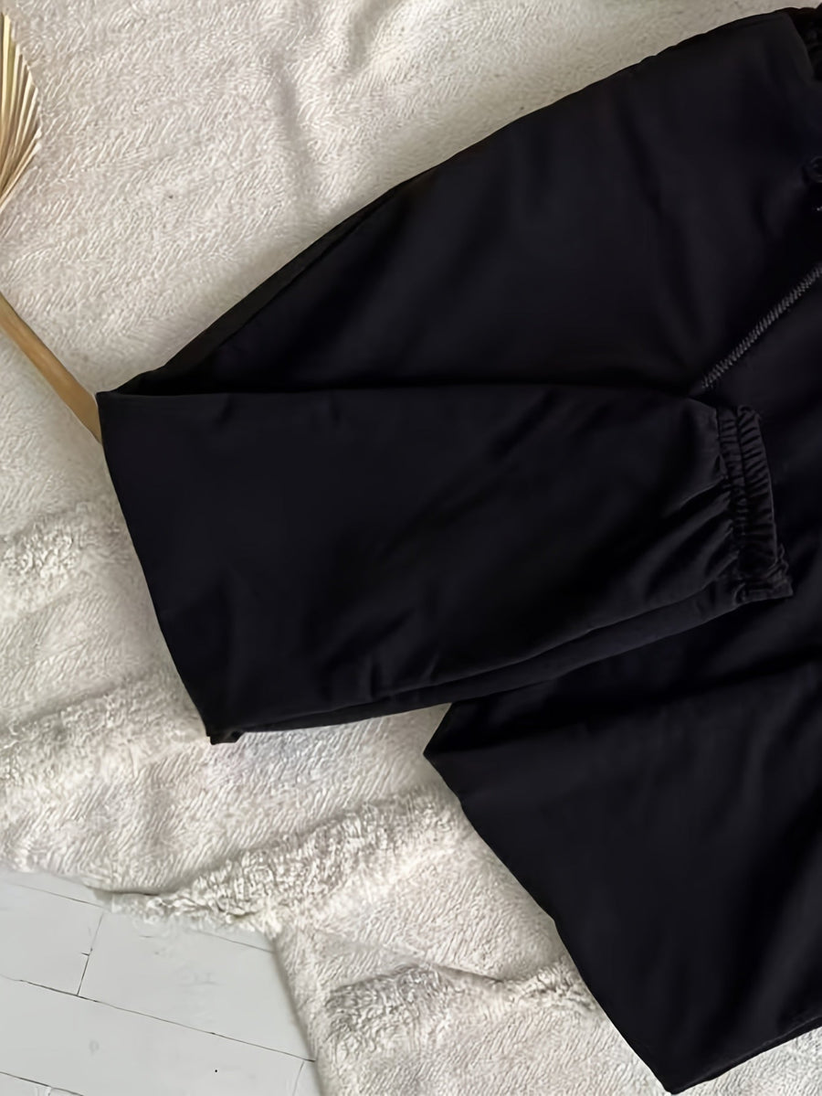 Svart träningsset med croptop och sweatpants för dam