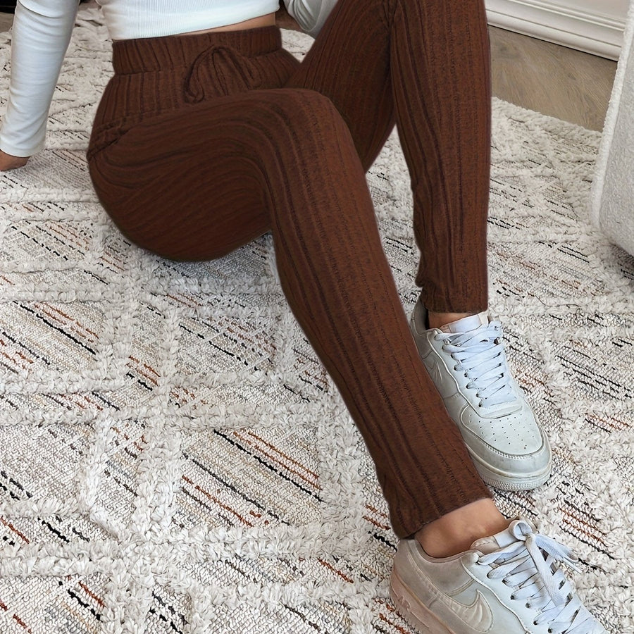 Ribbstickade leggings med hög midja och dragsko för dam