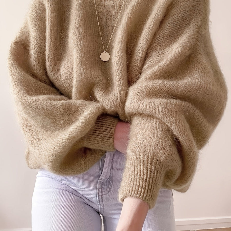 Lösstickad tröja med rund hals och lång ärm - Fluffig design med ribbstickade muddar