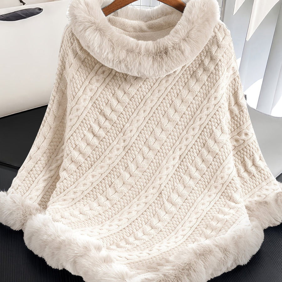 Kabelstickad poncho med fuskpälskant och polokrage