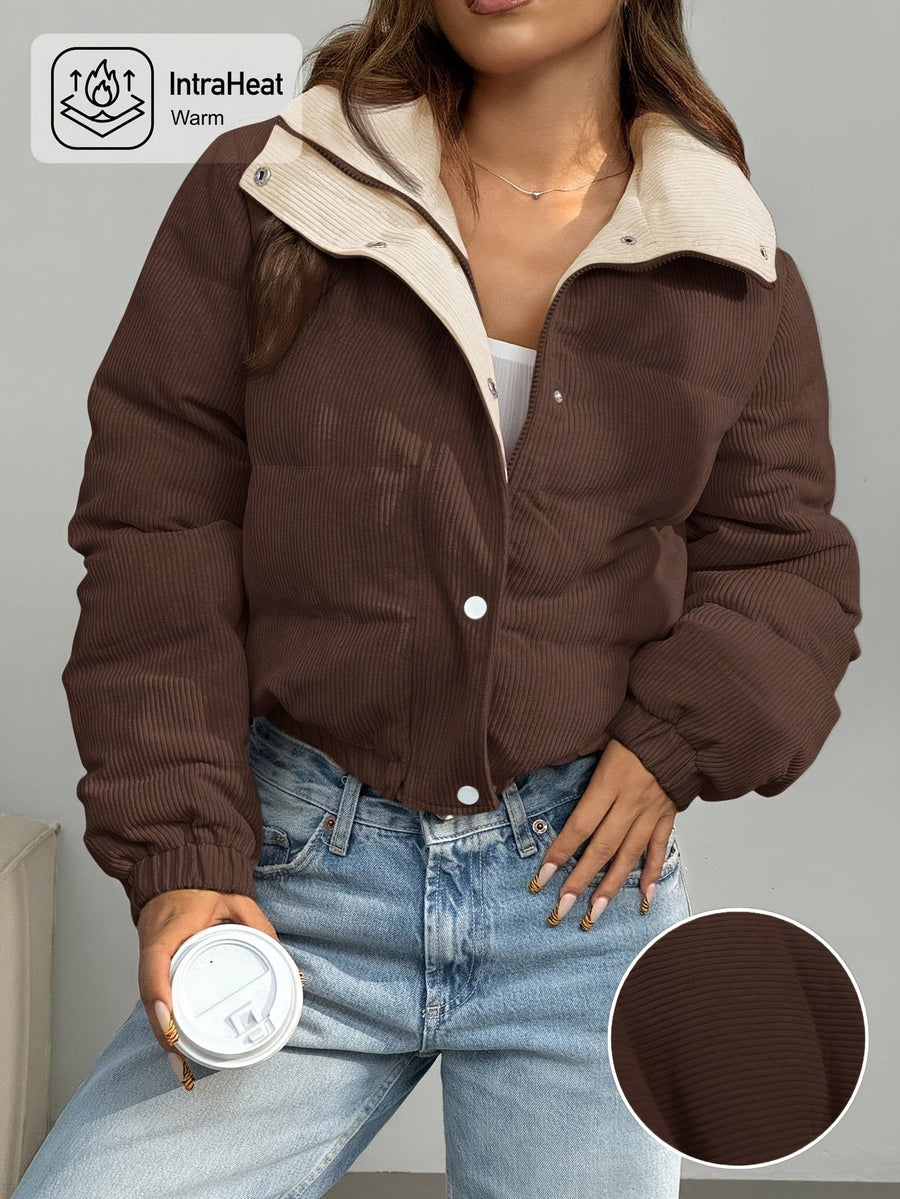 Kort corduroy pufferjacka med ståkrage i tvåfärgad design
