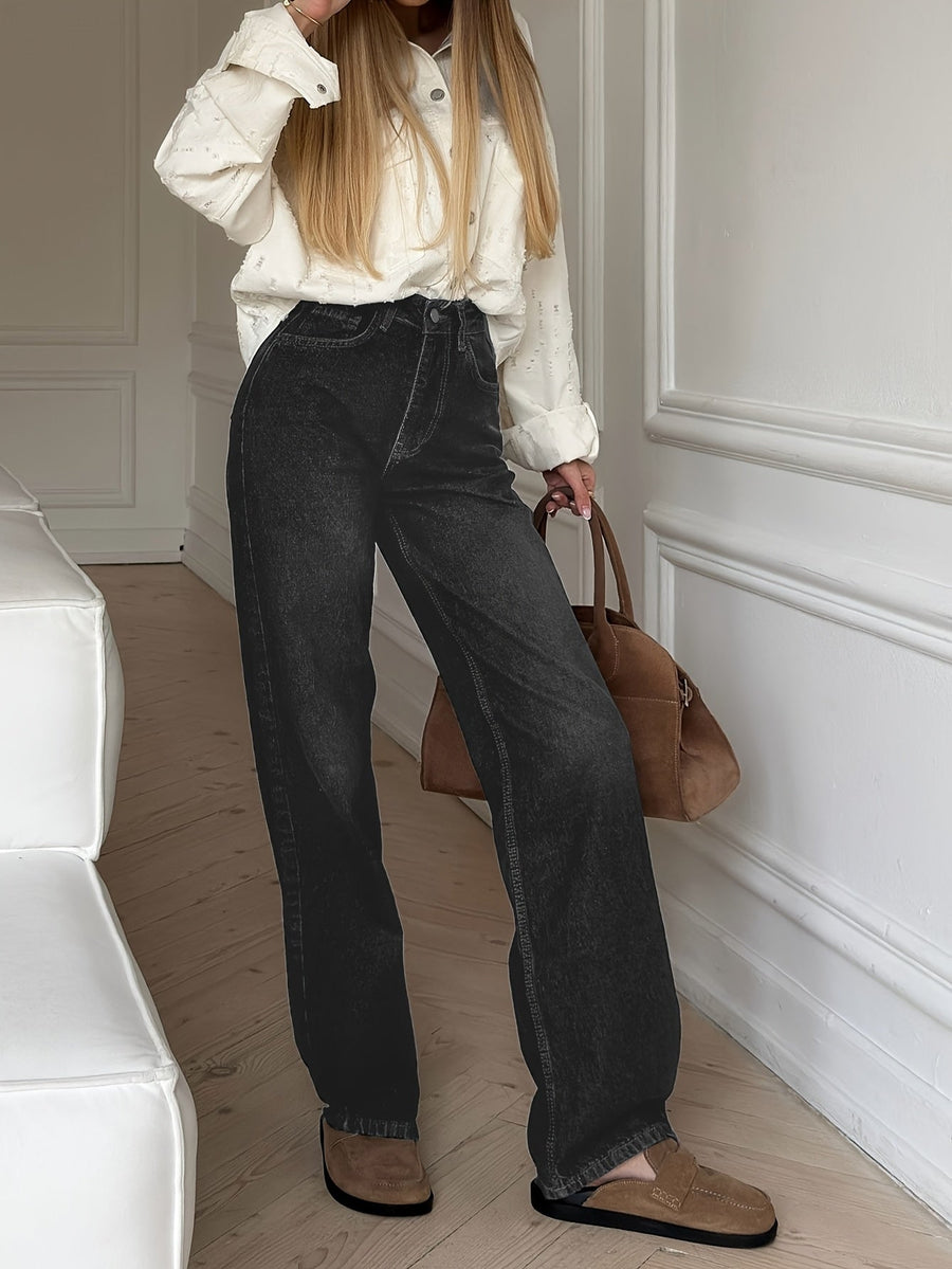 Vida jeans med hög midja och slitna detaljer