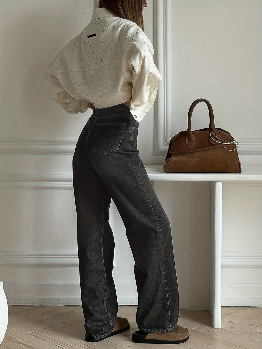 Vida jeans med hög midja och slitna detaljer