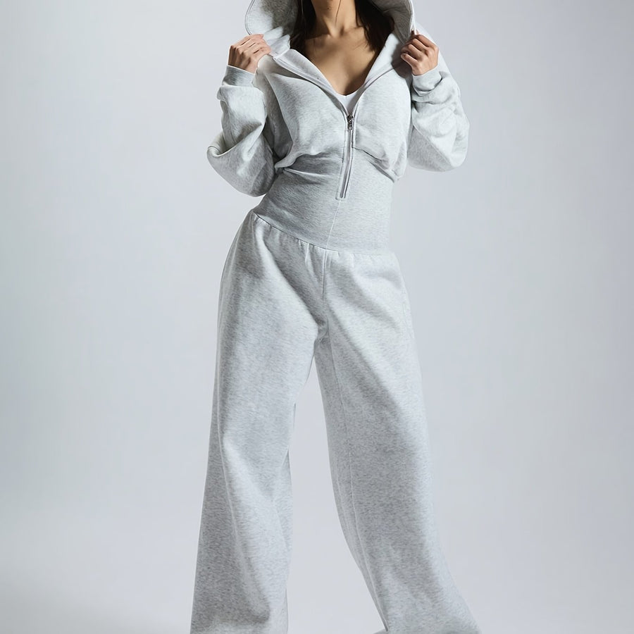 Dam jumpsuit med huva och dragkedja, vida ben