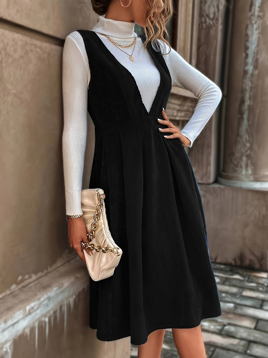 Marinblå manchester hängselklänning v-ringad A-linje med veck