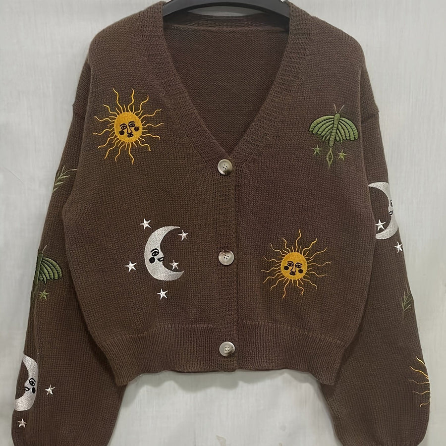Stickad kofta med V-ringning och broderade sol- och månmotiv, flera färger