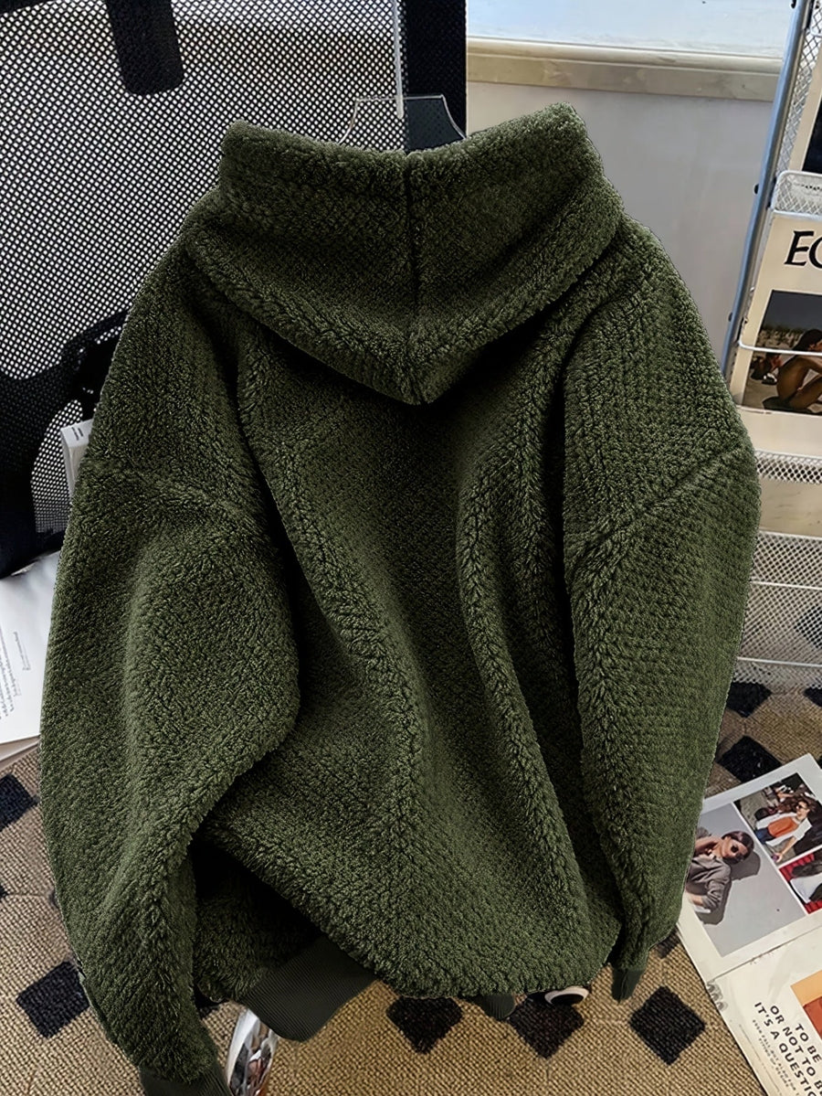Unisex teddyfleece hoodie med dragsko och magficka
