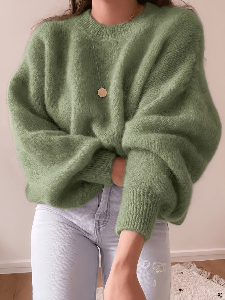 Lösstickad tröja med rund hals och lång ärm - Fluffig design med ribbstickade muddar