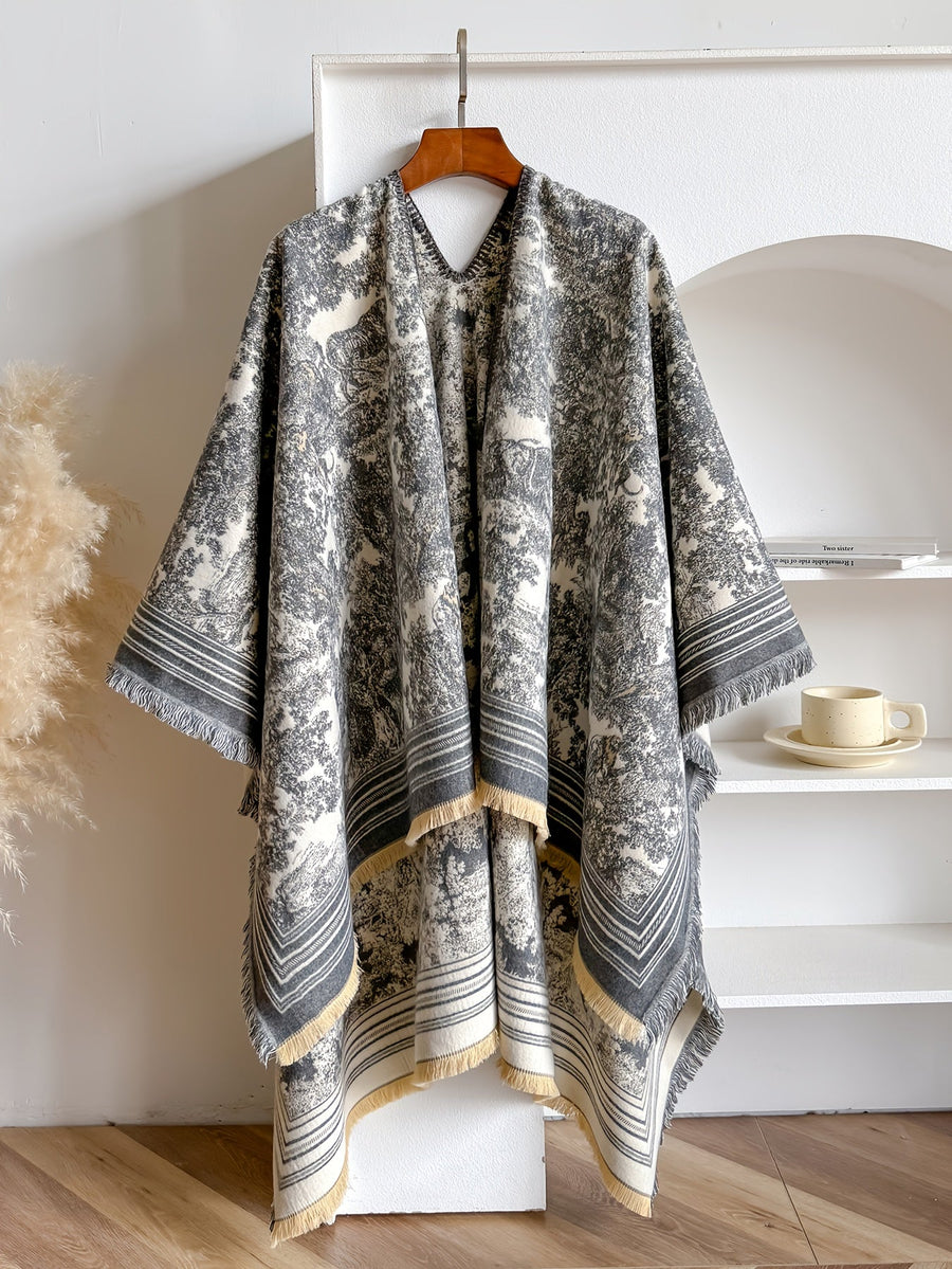 Poncho med mönster och fransar – flera färger