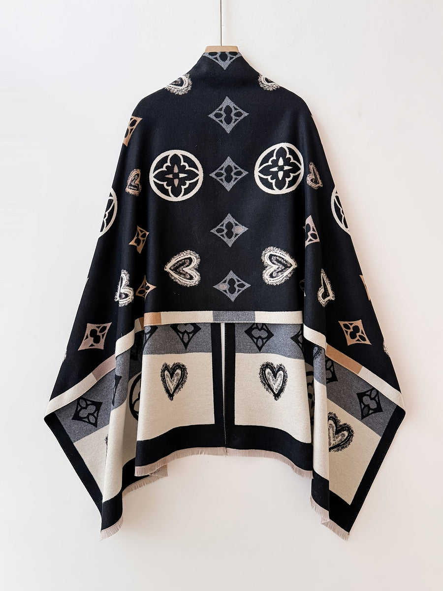 Poncho med mönster och fransar – Svart eller Flerfärgad