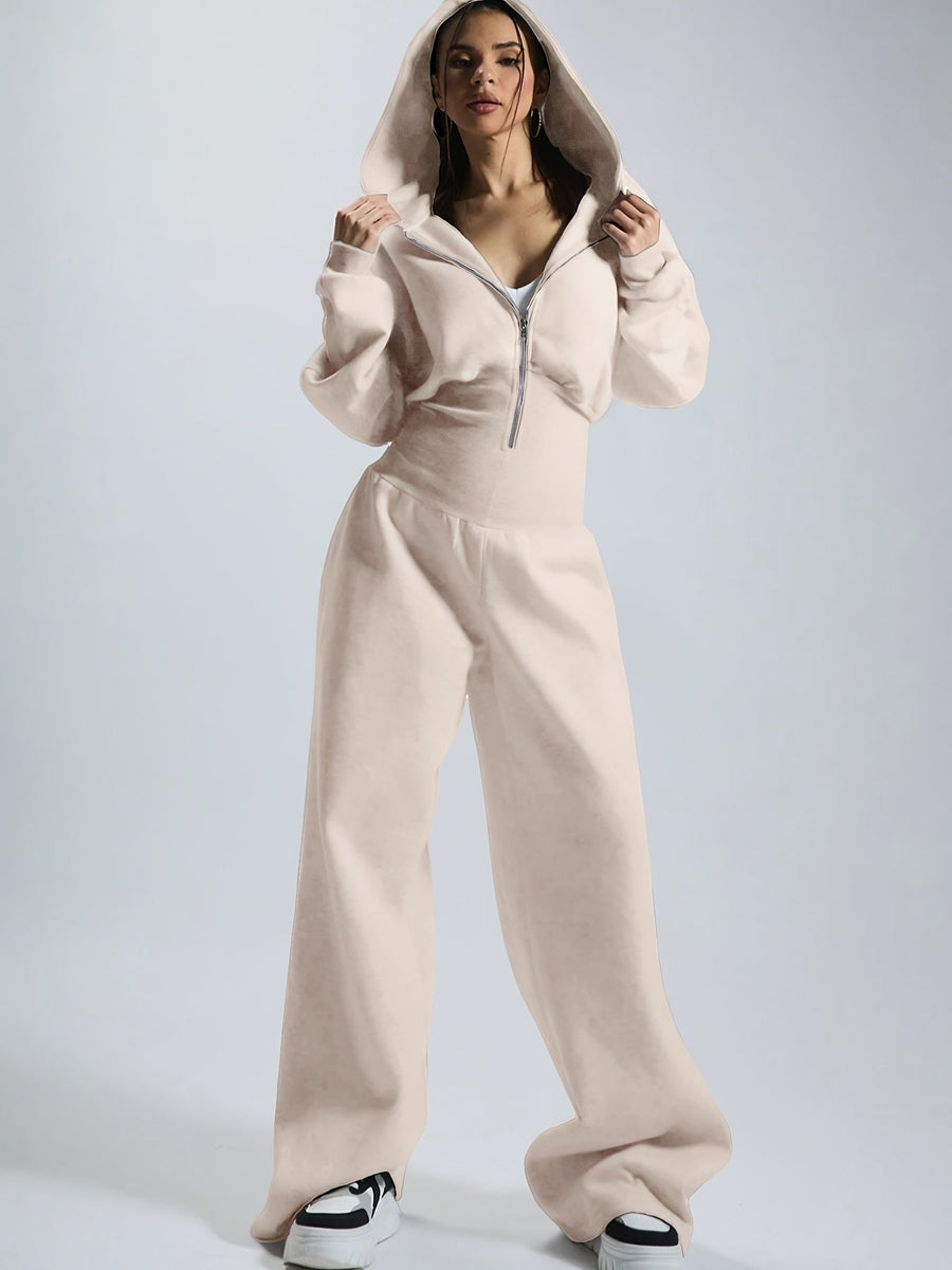 Dam jumpsuit med huva och dragkedja, vida ben