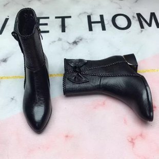 Bruna ankelstövlar med rosett och flätade detaljer, dragkedja, blockklack