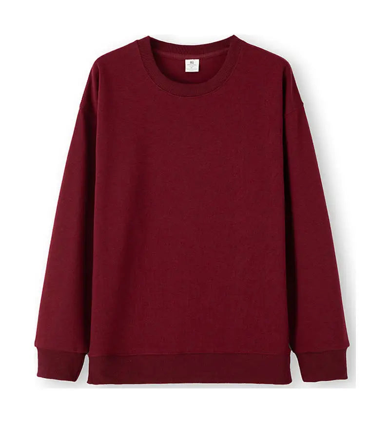 Enkel enfärgad sweatshirt med rund hals och lång ärm