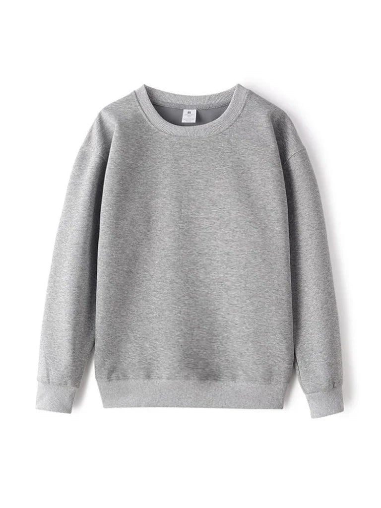 Enkel enfärgad sweatshirt med rund hals och lång ärm