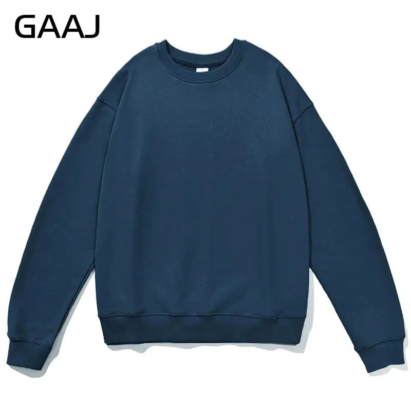 Enkel sweatshirt med rund hals, enfärgad och ribbade muddar