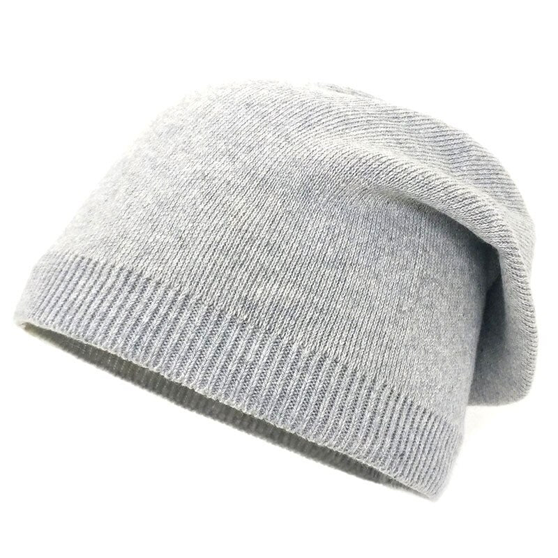 Mjuk slokande mössa i ribbad design, beige