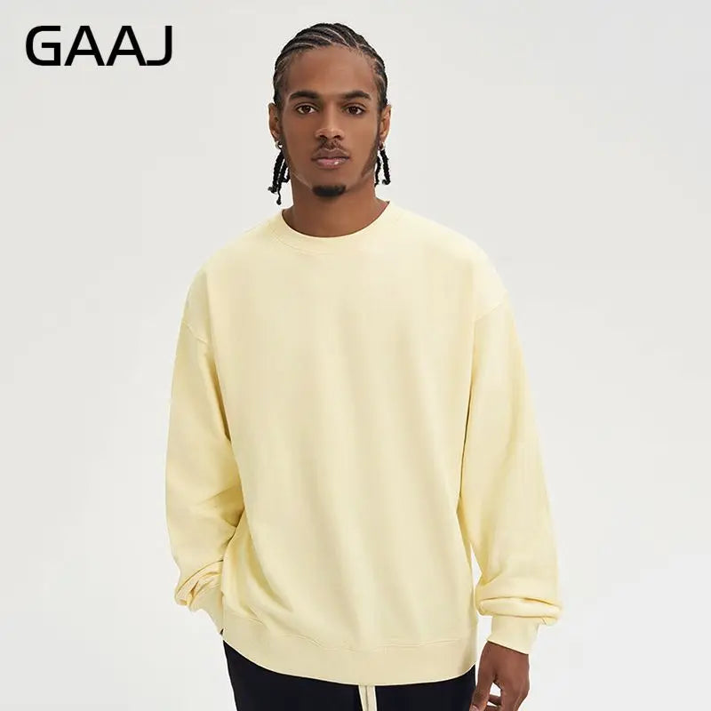 Enkel sweatshirt med rund hals, enfärgad och ribbade muddar