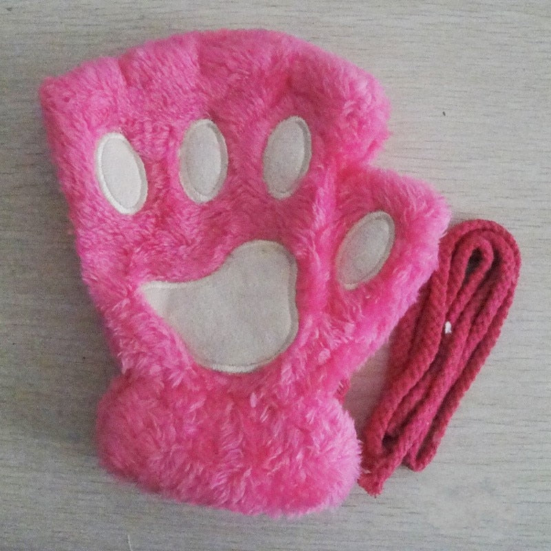 Rosa plyschhandskar utan fingrar med tassar