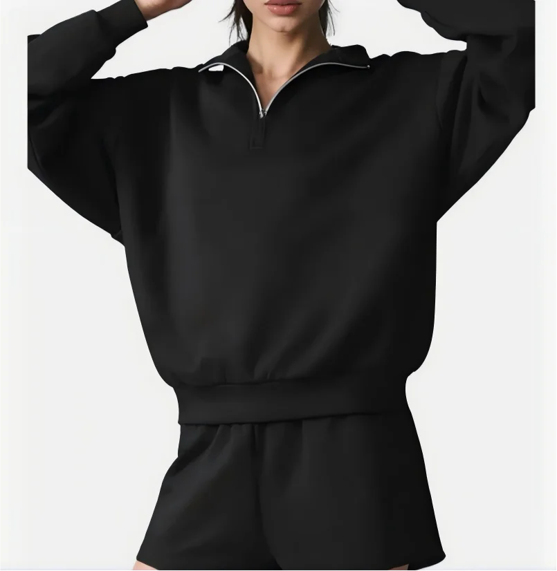 Grått set med halvzip-tröja och matchande shorts