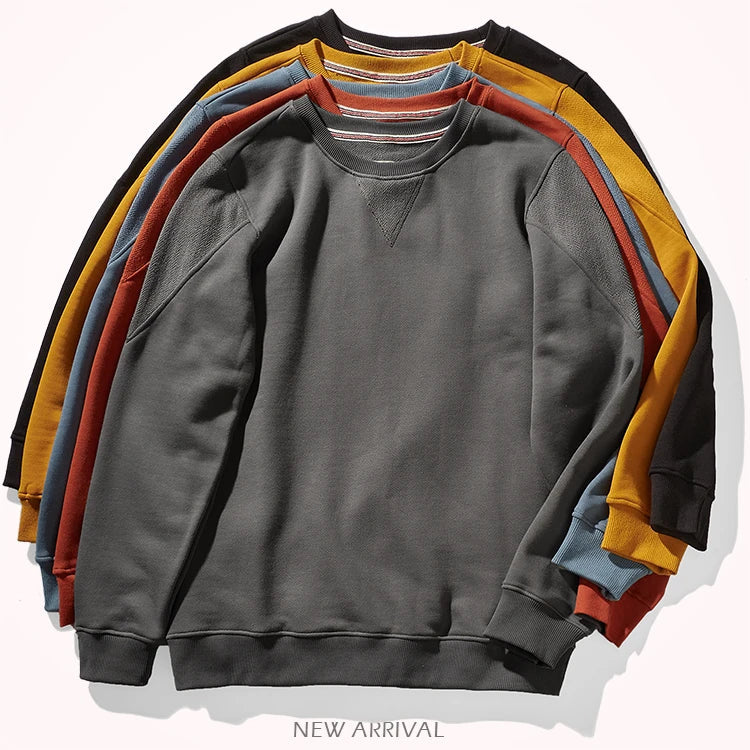 Unisex sweatshirt med rundhalsad krage, ribbade muddar och V-detalj, flera färger