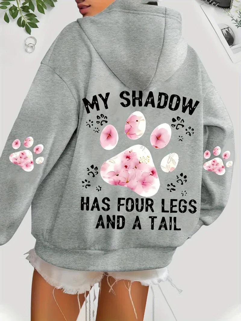 Hoodie med "My Shadow Has Four Legs And A Tail" tryck och blommiga tassar
