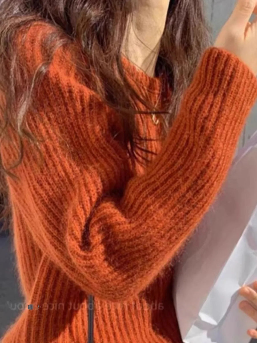 Orange ribbstickad tröja med rund hals