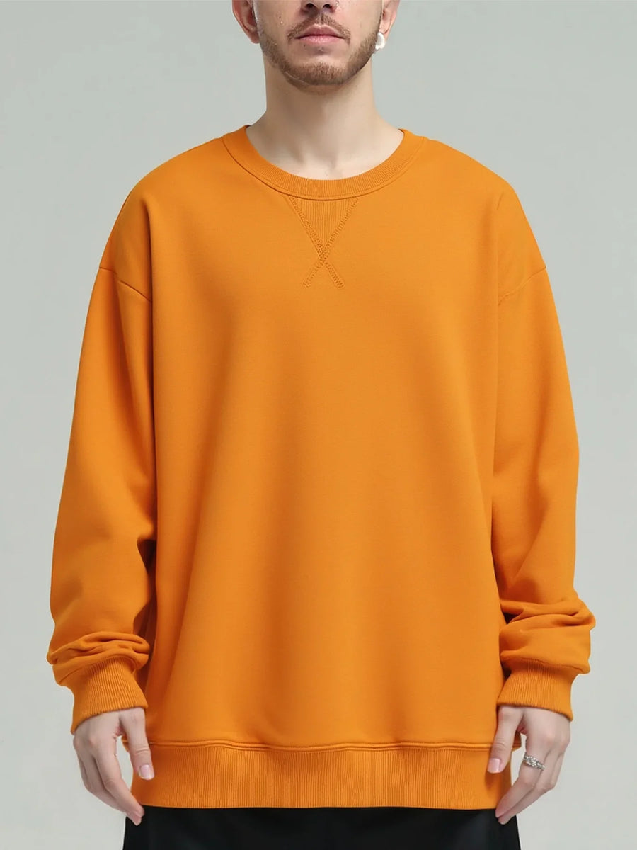 Unisex sweatshirt med rund hals, enfärgad design och ribbade muddar