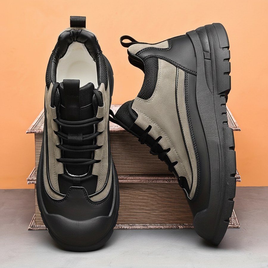 Herrsneakers i tvåfärgad design med tjock sula, snörning och förstärkt tåhätta