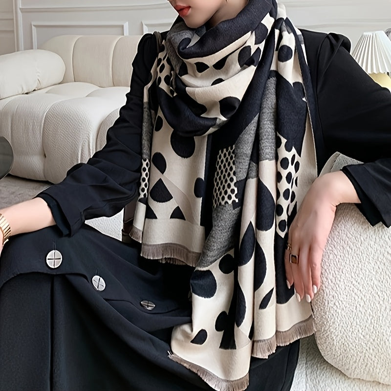 Svart och beige mönstrad scarf med fransar, stora och små prickar