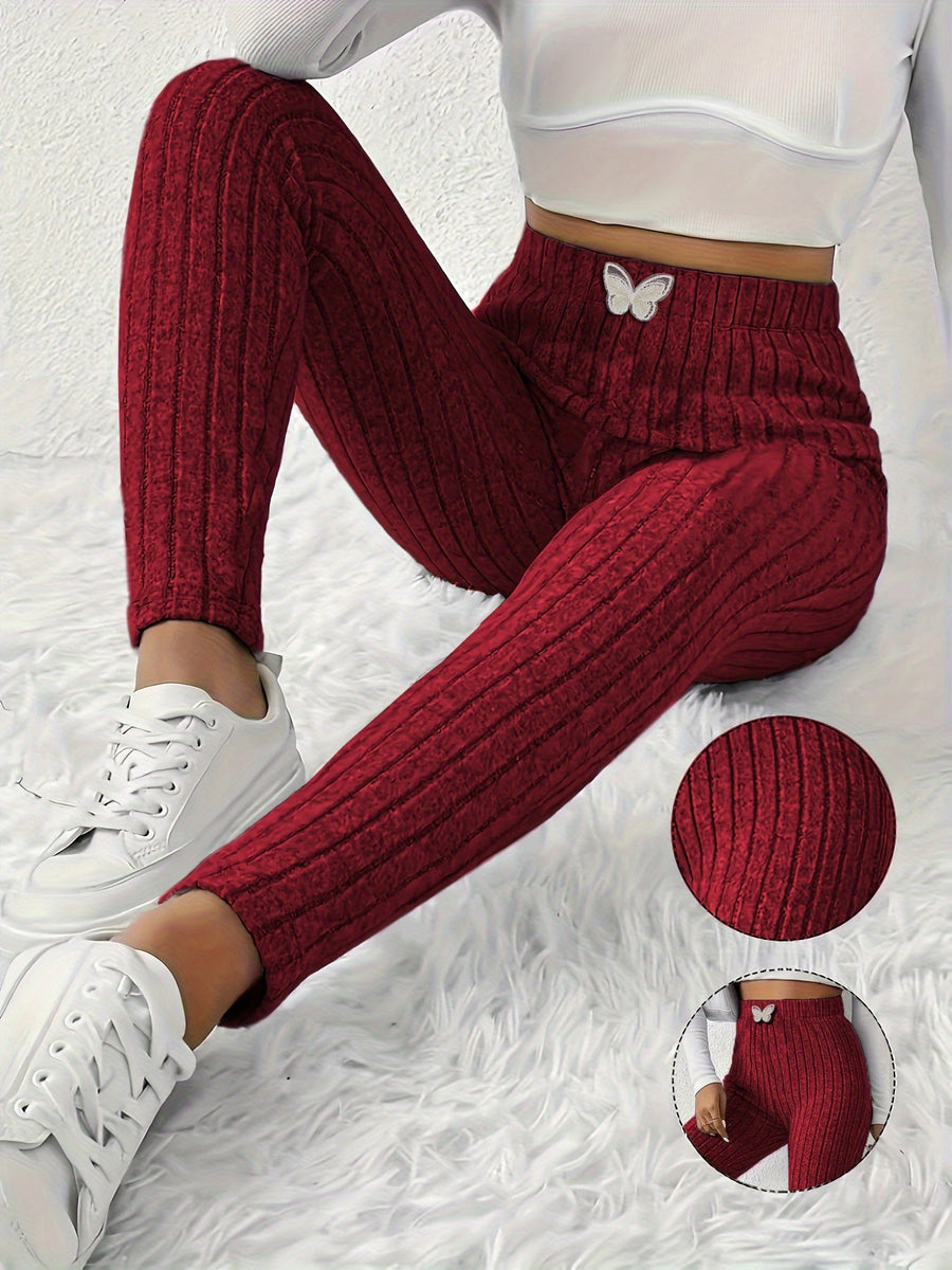 Gråa Dam Leggings med Ribbad Struktur och Fjärilsdetalj, Hög Midja