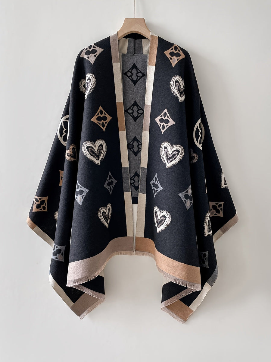 Poncho med mönster och fransar – Svart eller Flerfärgad