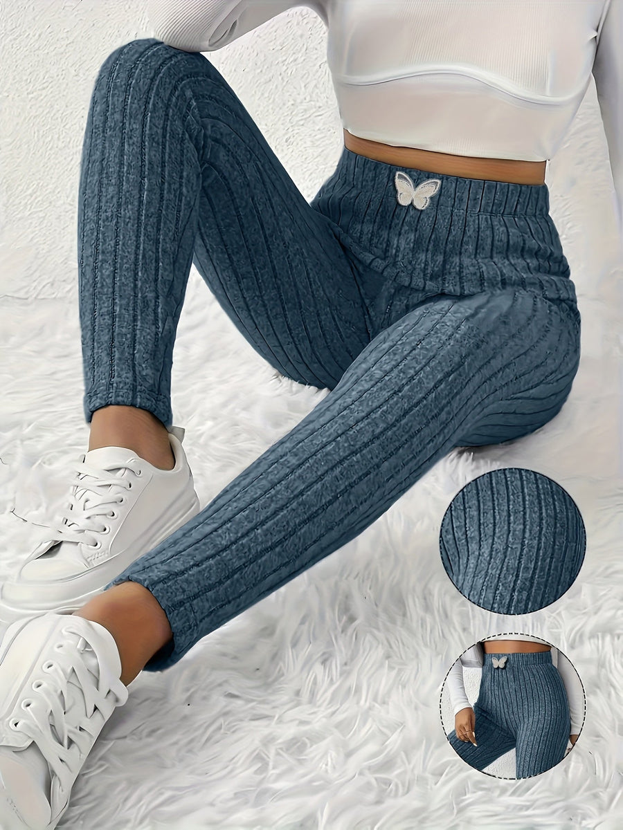 Gråa Dam Leggings med Ribbad Struktur och Fjärilsdetalj, Hög Midja