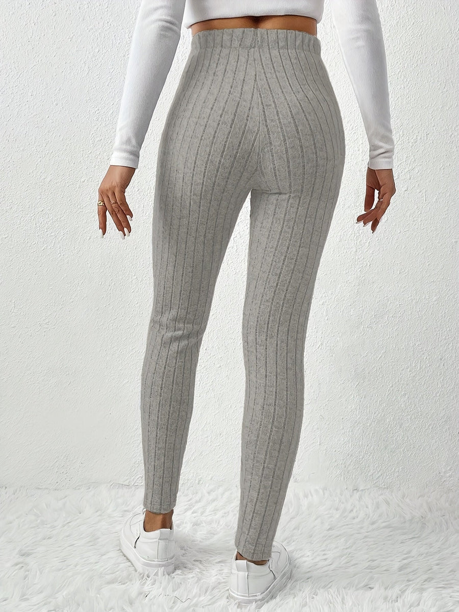 Ribbstickade leggings med hög midja och dragsko för dam