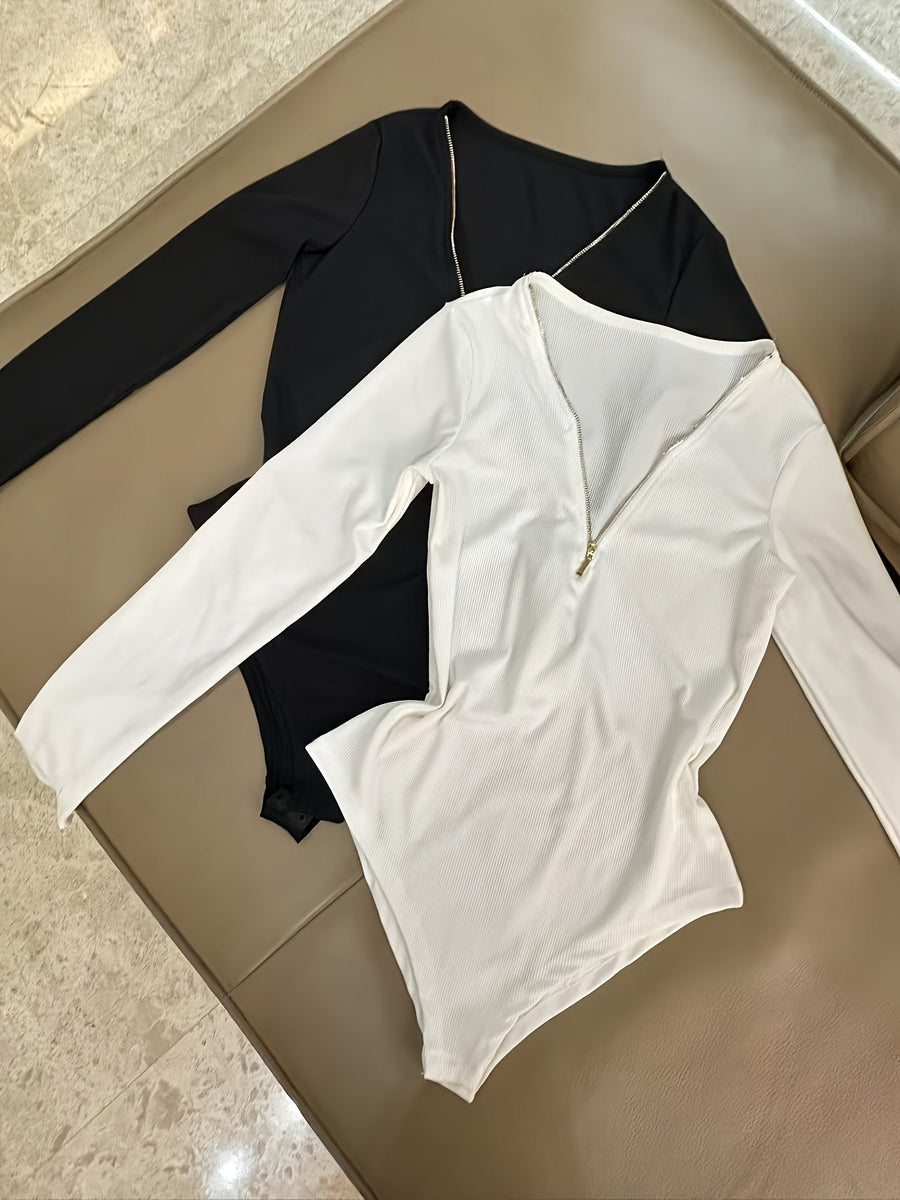 Dam bodysuit med dragkedja i ribbat material och lång ärm, flerfärgad