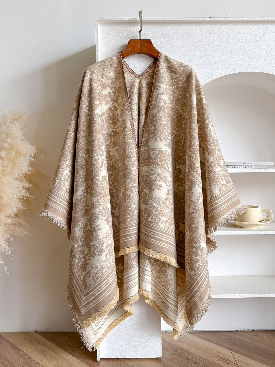Poncho med mönster och fransar – flera färger